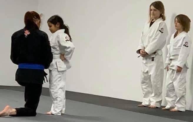 Valarie earns her first stripe from coach Karen