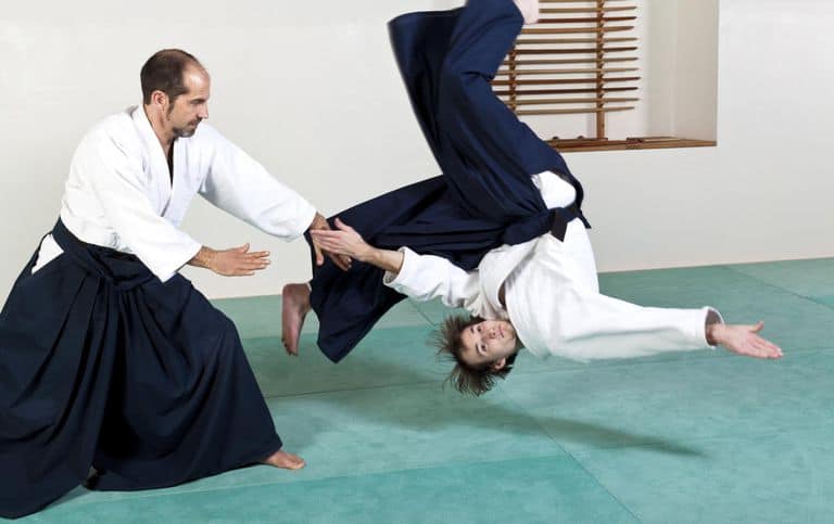 Aikido demonstrating the "ability" to force a grown man into a full front-flip with a mere flick of the wrist. A gentle art, sure, but also unrealistic and fantastic. 